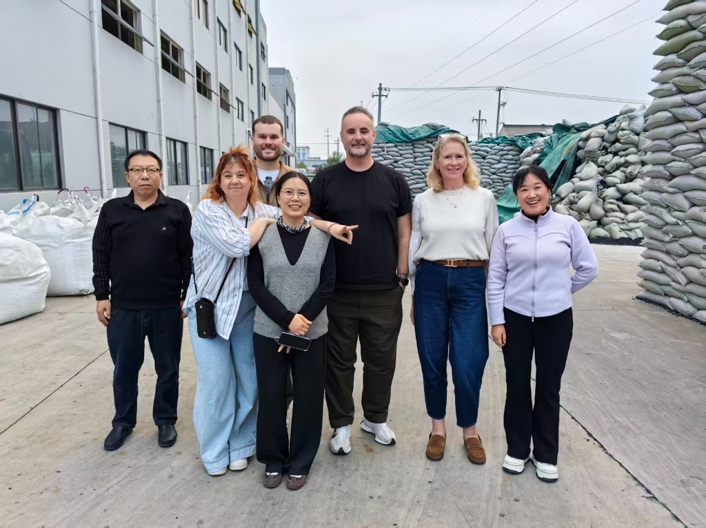Earth Protex team at an industrial facility with bulk material storage